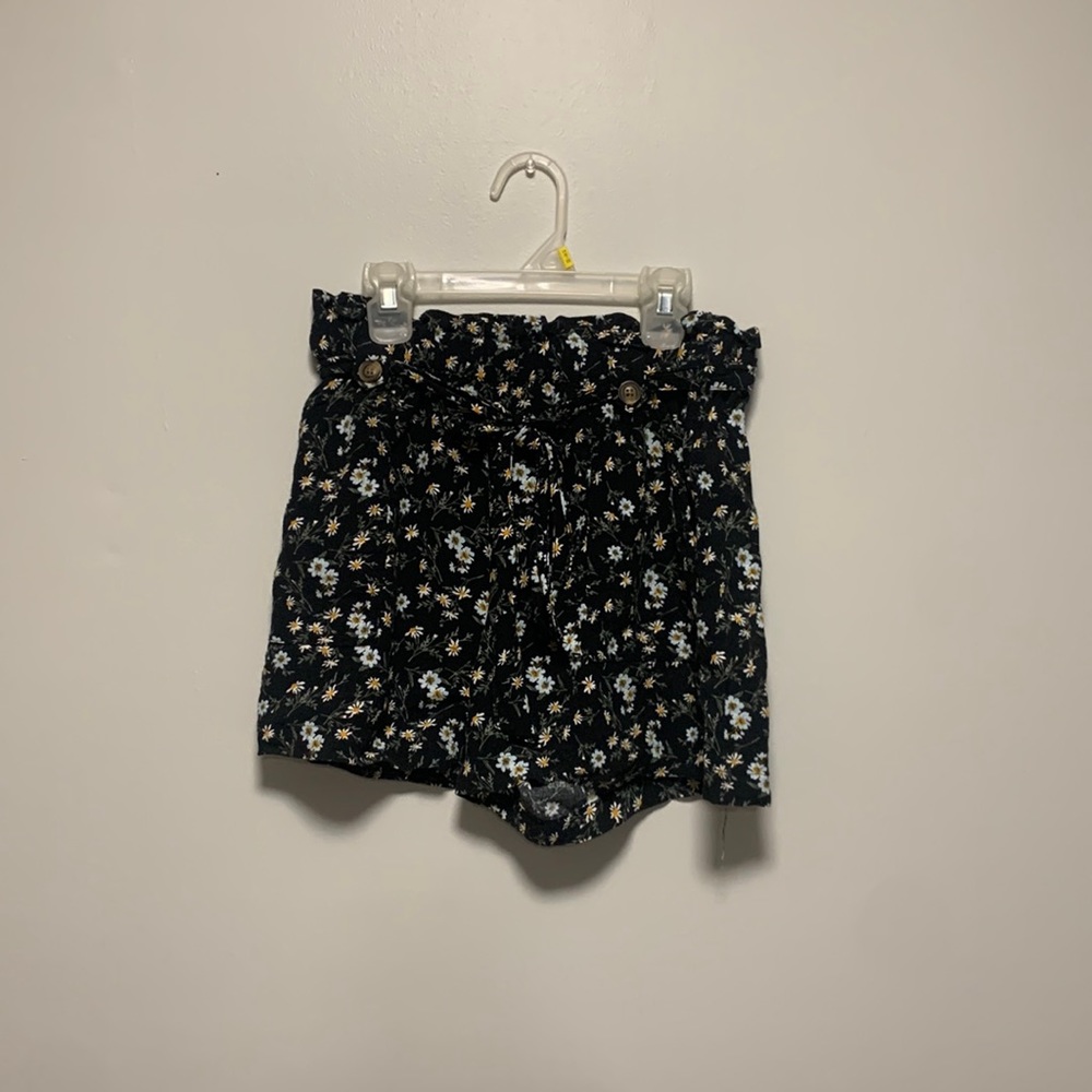 Black floral shorts with belt